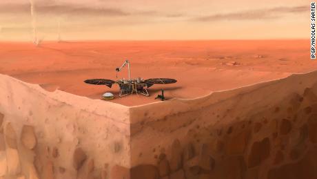 Ilustracja przedstawia lądownik InSight NASA siedzący na powierzchni Marsa z warstwami pod powierzchnią planety poniżej.